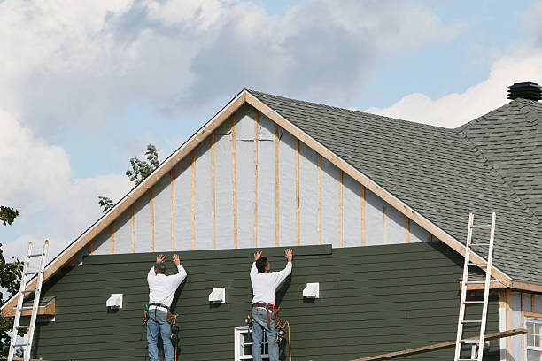Professional Siding technician working in Foster, KY